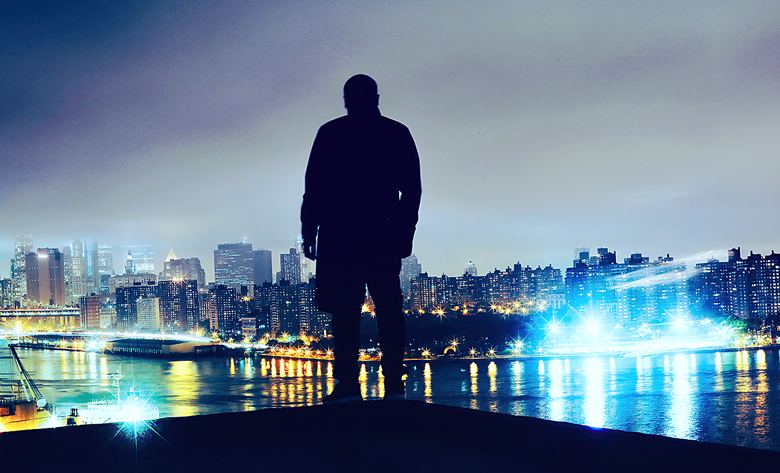 Screenshot of a scene displaying a person's silhouette and a nighttime city skyline.