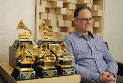 Image of Randy Merill with his Grammy Awards trophies