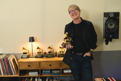 Image of Michael Romanowski with his Grammy Awards trophies