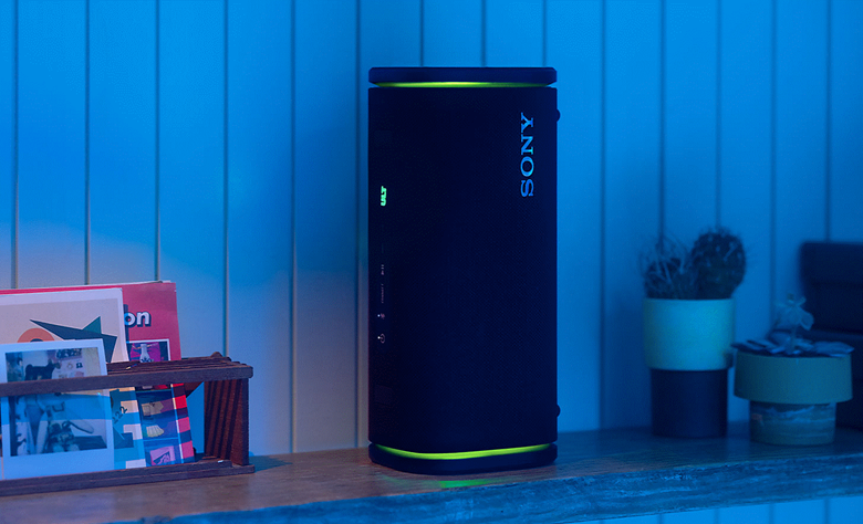 The ULT FIELD 5 speaker standing vertically on a shelf with the party lights on