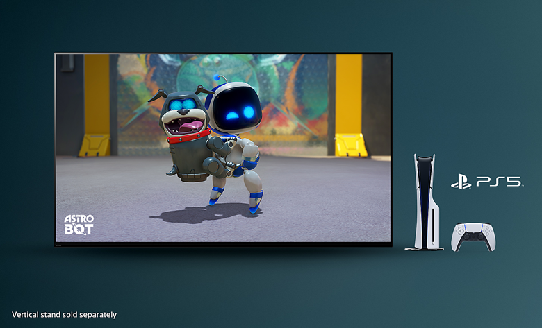 TV displaying Astro Bot video game scene, with PS5 console and controller beside it. A note stating 'Vertical stand sold separately' is shown.